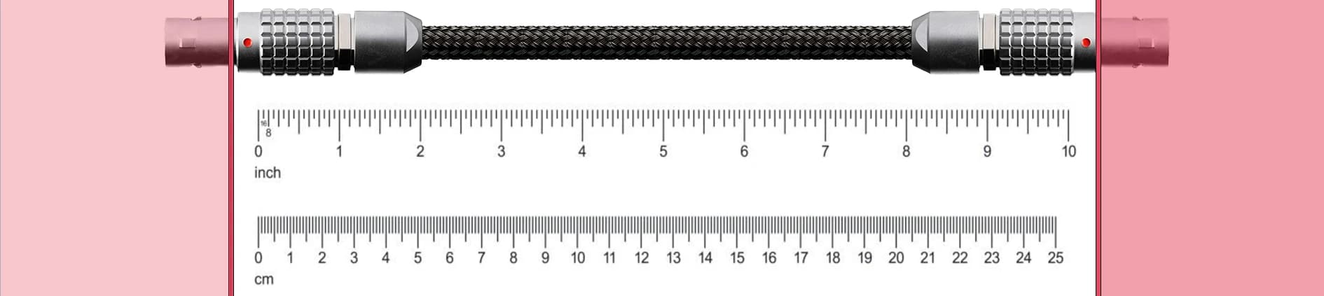 A cable between two Lemo connectors, with an inch and a centimetre ruler below it, showing that the length is measured from one socket face to the other.